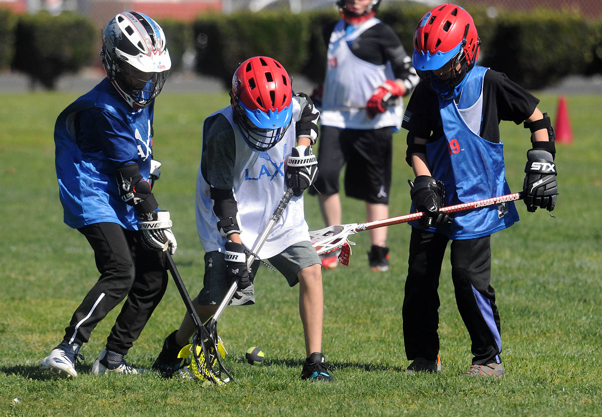 Pick up a stick, play lacrosse or hockey with PUCKidz