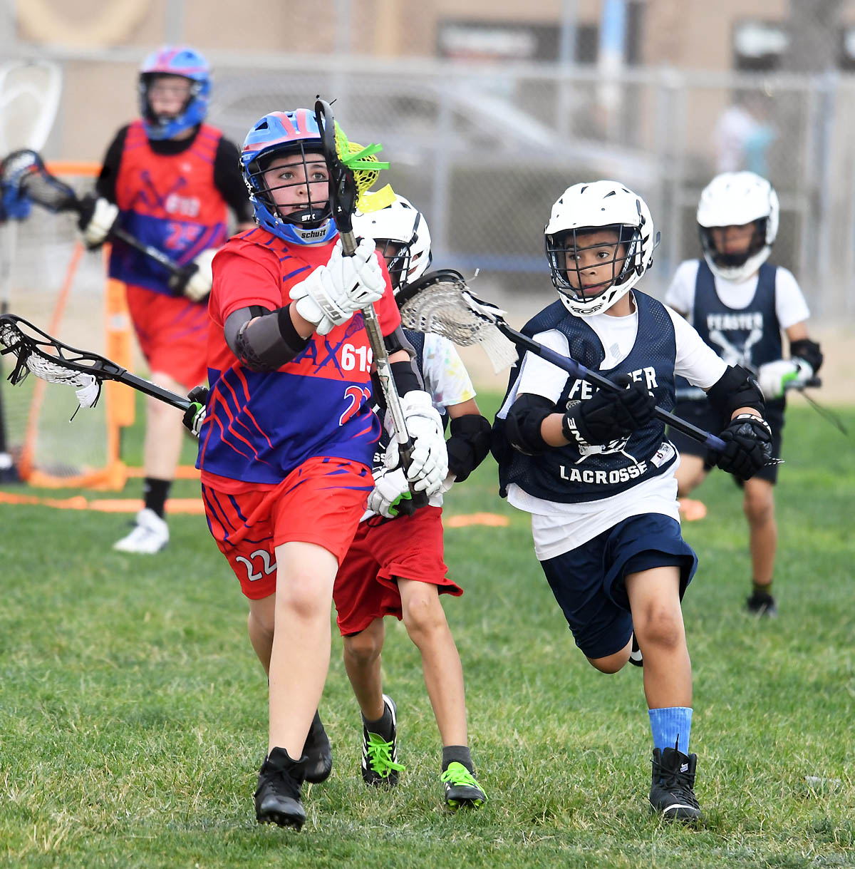 Pick up a stick, play lacrosse or hockey with PUCKidz